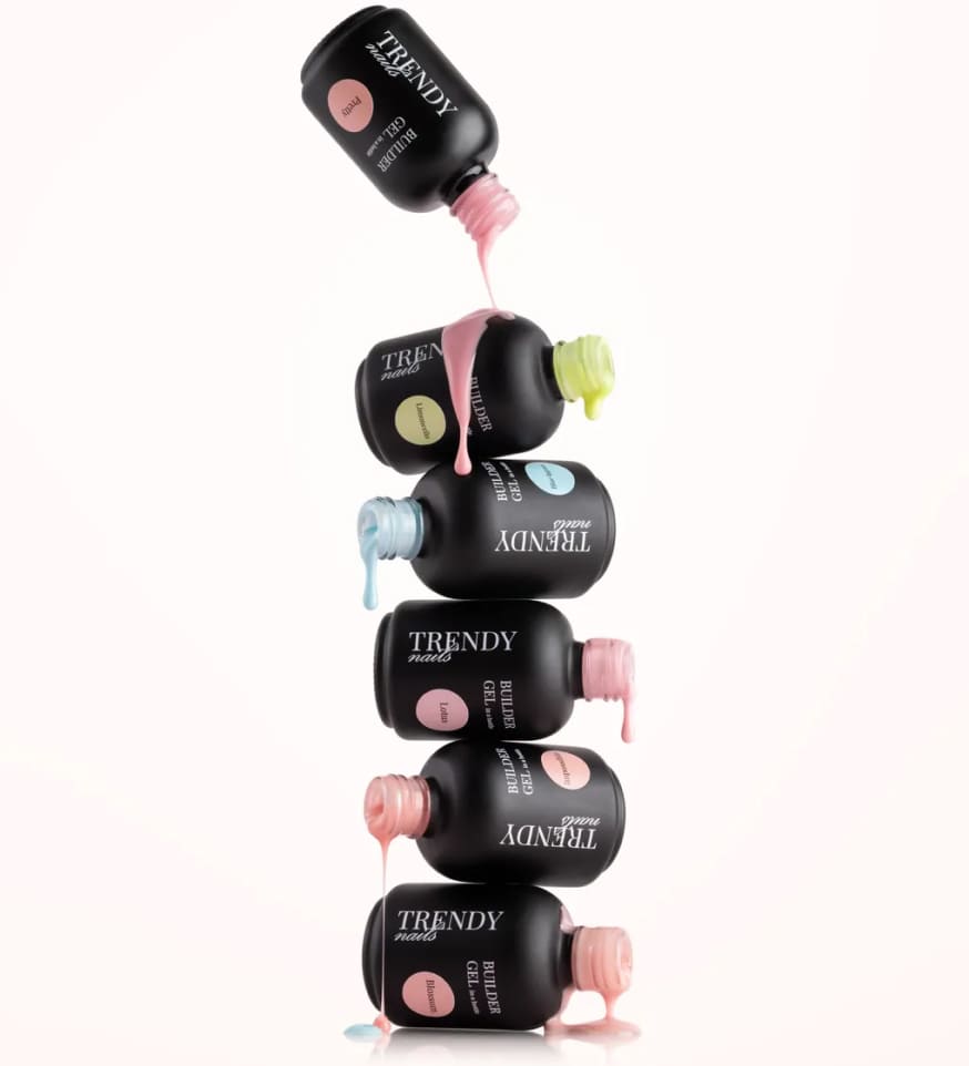 Stacked Trendy Nails bottles with dripping polish