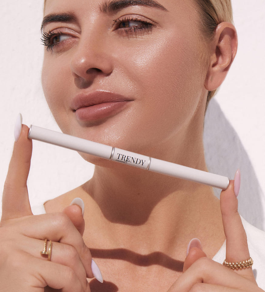 Woman holding a Trendy Nails product