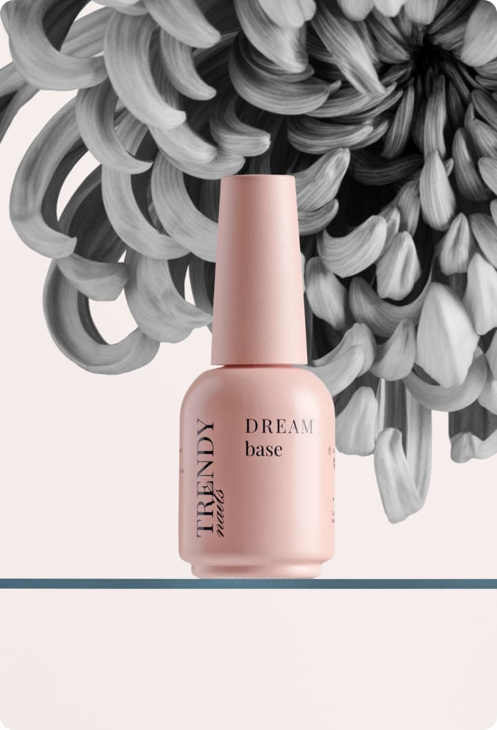 Hero image of Trendy Nails DREAM base bottle with a floral background