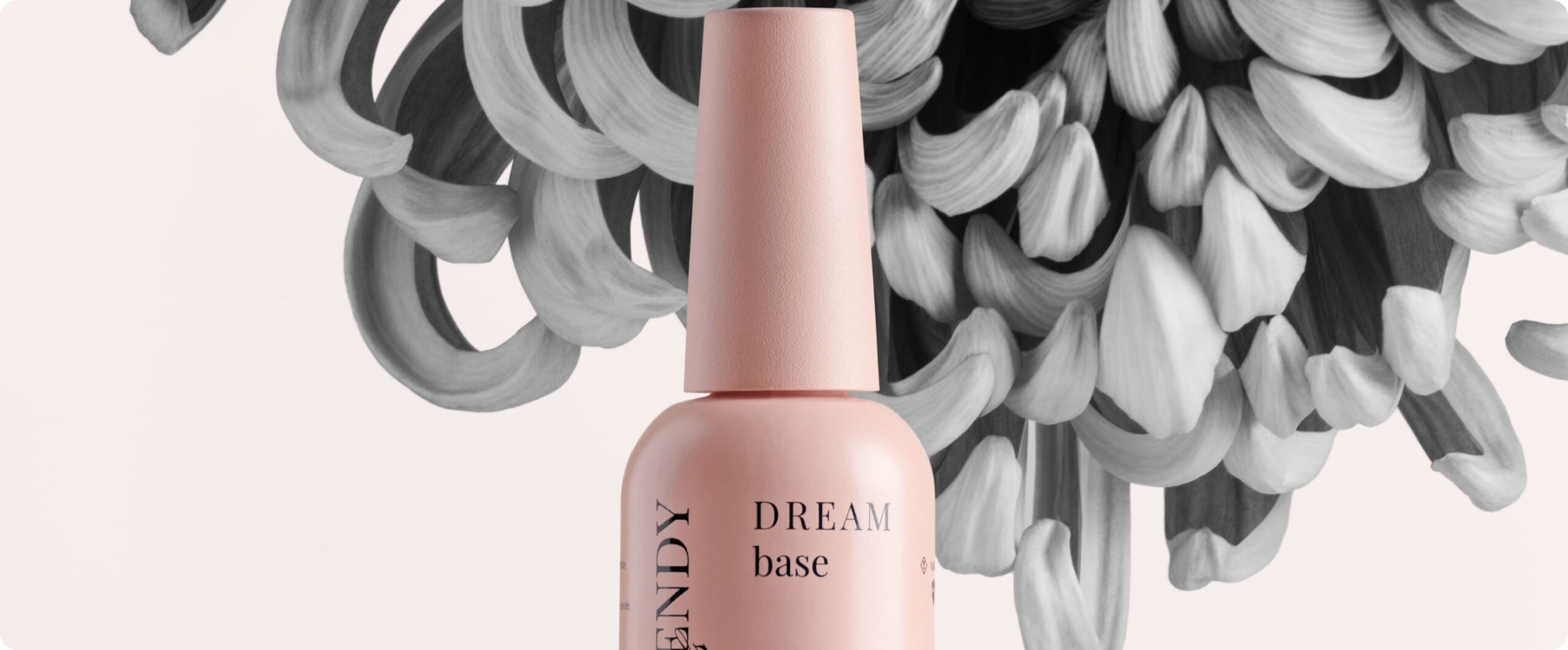 Hero image of Trendy Nails DREAM base bottle with a floral background