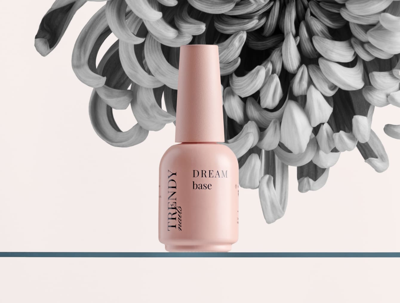 Trendy Nails DREAM base bottle with a floral background